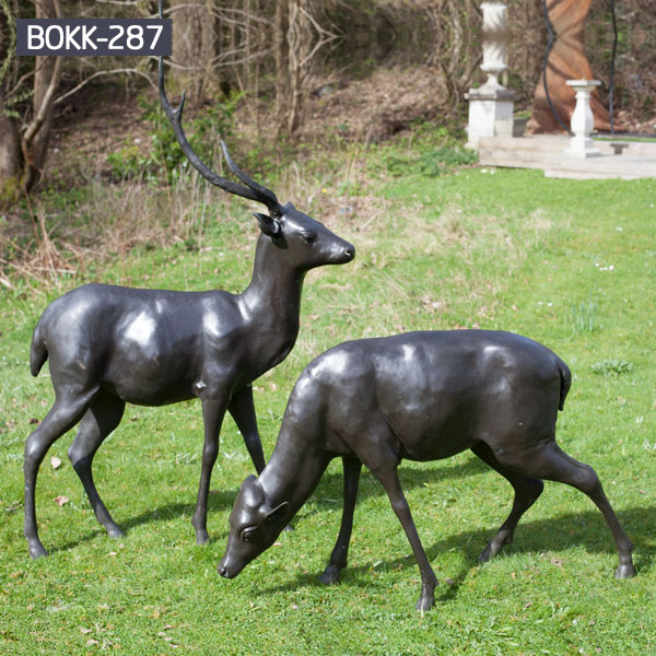  A pair of life size deer grazing bronze lawn statues costs