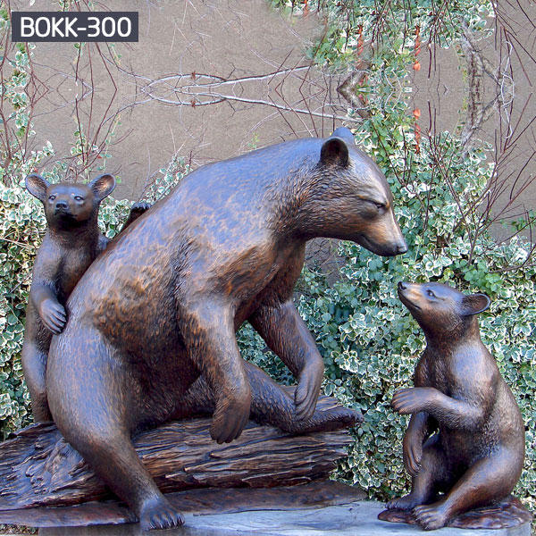 Metal bronze polar bear statue and cubs sitting on trunks to buy